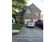 Charming brick home featuring an attached two car garage and a well-maintained front yard at 11657 Flemming Ct, Hampton, GA 30228