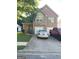 Attractive two-story home with a two-car garage, brick facade, and driveway with parked vehicles at 11657 Flemming Ct, Hampton, GA 30228