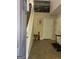 Bright foyer featuring a staircase, neutral decor, and tile flooring at 11657 Flemming Ct, Hampton, GA 30228
