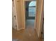 Hallway showing access to adjacent bedrooms at 11657 Flemming Ct, Hampton, GA 30228