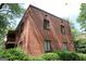 Exterior of the apartment complex made of brick and green landscaping at 1381 Ne Normandy Ne Dr # 4, Atlanta, GA 30306