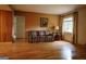 Open living room with wood flooring, a large window, and a comfortable, inviting atmosphere at 1381 Ne Normandy Ne Dr # 4, Atlanta, GA 30306