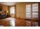 Comfortable living room featuring wood flooring, a large window, and ample natural light at 1381 Ne Normandy Ne Dr # 4, Atlanta, GA 30306