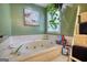 Relaxing bathroom with a large tub, perfect for unwinding after a long day at 78 N Pomona Rd, Hampton, GA 30228