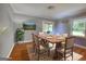 Staged dining room with hardwood flooring, and lots of natural light at 78 N Pomona Rd, Hampton, GA 30228