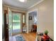Inviting entryway with a traditional wood door, decorative glass, and charming accents at 78 N Pomona Rd, Hampton, GA 30228