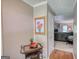 Inviting foyer featuring hardwood floors and a peek into the living room at 78 N Pomona Rd, Hampton, GA 30228