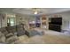 Open living room with plush seating and easy access to the kitchen at 78 N Pomona Rd, Hampton, GA 30228