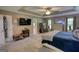 The primary bedroom features a tv and a safe, offering both entertainment and security at 78 N Pomona Rd, Hampton, GA 30228