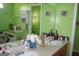 Bright bathroom featuring a double sink vanity with plenty of counter space and a large mirror at 239 Ferguson Ave, Locust Grove, GA 30248