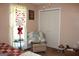 Bedroom features closet, ceiling fan, window, and seat at 239 Ferguson Ave, Locust Grove, GA 30248