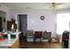 Bright dining area with natural light and a view of the backyard, ideal for casual meals at 239 Ferguson Ave, Locust Grove, GA 30248