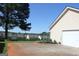 Exterior view of the driveway, garage, and backyard of a house at 239 Ferguson Ave, Locust Grove, GA 30248