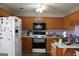 Well-equipped kitchen with essential appliances and plenty of counter space at 239 Ferguson Ave, Locust Grove, GA 30248