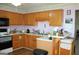 Practical kitchen with an island, great counter space, and appliances, ready for any cook at 239 Ferguson Ave, Locust Grove, GA 30248