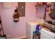 Bright laundry room featuring updated washer and dryer at 239 Ferguson Ave, Locust Grove, GA 30248