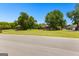 Beautiful homes on expansive, well-manicured lawns create a picturesque neighborhood setting at 125 Lake Park Dr, Sharpsburg, GA 30277