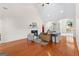 Bright living room with vaulted ceiling, fireplace, and ample natural light at 125 Lake Park Dr, Sharpsburg, GA 30277