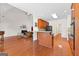 Open-concept space with fireplace, kitchen island, and plenty of room at 125 Lake Park Dr, Sharpsburg, GA 30277