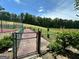 View of the fenced community dog park at 1503 Wingate Way # 1503, Sandy Springs, GA 30350
