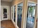 Gym entrance featuring glass windows displaying a fitness center with various machines and equipment at 1503 Wingate Way # 1503, Sandy Springs, GA 30350