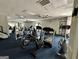 Well-equipped gym featuring treadmills, stationary bikes, weight machines, and ample space for exercise at 1503 Wingate Way # 1503, Sandy Springs, GA 30350