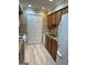 Functional kitchen with wood cabinets, granite countertops, and modern appliances at 1503 Wingate Way # 1503, Sandy Springs, GA 30350