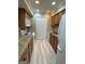 Functional kitchen with wood cabinets, granite countertops, and modern appliances at 1503 Wingate Way # 1503, Sandy Springs, GA 30350