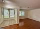 Inviting living room featuring gleaming hardwood floors and a separate breakfast nook at 1503 Wingate Way # 1503, Sandy Springs, GA 30350