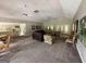 Expansive living room featuring a cozy seating area, ceiling fans, and easy access to the kitchen at 1503 Wingate Way # 1503, Sandy Springs, GA 30350