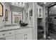 Modern bathroom featuring a black bowl sink, marble countertop, and a sleek glass-enclosed shower at 4320 Blue Ridge Dr, Douglasville, GA 30135
