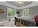 Spacious bedroom with ceiling fan, private balcony and large windows providing ample natural light at 4320 Blue Ridge Dr, Douglasville, GA 30135