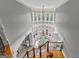 Aerial view of dining area with large bay window, glass table and chandelier at 4320 Blue Ridge Dr, Douglasville, GA 30135