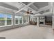 Bright and airy living room with large windows and a fireplace at 4320 Blue Ridge Dr, Douglasville, GA 30135