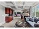 This living room offers a fireplace, custom cabinetry, and an adjacent wet bar area at 4320 Blue Ridge Dr, Douglasville, GA 30135