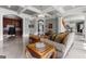 Open-concept living room features tiled floors and decorative area rugs at 4320 Blue Ridge Dr, Douglasville, GA 30135