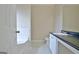 Bright bathroom with shower, vanity, and tile flooring at 10690 Tara Village Way, Joneboro, GA 30238