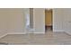 Bedroom showcases great flow into an en suite bathroom and an additional doorway to another room at 10690 Tara Village Way, Joneboro, GA 30238