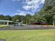 This is the community playground that has slides, climbing structures, and swings at 10690 Tara Village Way, Joneboro, GA 30238