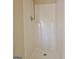 A shower features a detachable shower head and integrated soap dish at 10690 Tara Village Way, Joneboro, GA 30238