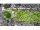 Aerial view of the property lines showing home's location amid lush greenery at 145 Adams Ct, Fayetteville, GA 30214