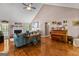 Spacious living room with vaulted ceiling, hardwood flooring, and natural light at 145 Adams Ct, Fayetteville, GA 30214