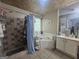 Spacious bathroom with shower, soaking tub, vanity with sink and a large window at 212 Hunting Court, Jonesboro, GA 30236