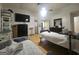 Bedroom with two beds, ceiling fan and a view into the Primary bathroom at 212 Hunting Court, Jonesboro, GA 30236