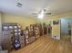 Spacious bedroom with hardwood floors and a ceiling fan at 212 Hunting Court, Jonesboro, GA 30236