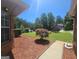 Beautiful front yard with lush greenery, manicured landscaping, and a view of a well-maintained home at 212 Hunting Court, Jonesboro, GA 30236