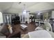 Open living area showing tile flooring, seating, and connection to the kitchen at 212 Hunting Court, Jonesboro, GA 30236