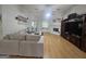 Living room boasts hardwood flooring, a fireplace, and a comfortable seating area for relaxing at 212 Hunting Court, Jonesboro, GA 30236