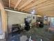 Spacious screened porch with ceiling fan, grill and backyard access at 212 Hunting Court, Jonesboro, GA 30236