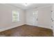 Inviting bedroom boasts wood floors, natural light, and neutral paint, creating a cozy atmosphere at 317 Mcpherson Se Pl, Atlanta, GA 30316